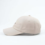 Wiild Swimwear Mahua Cap in beige color  viewed from the side